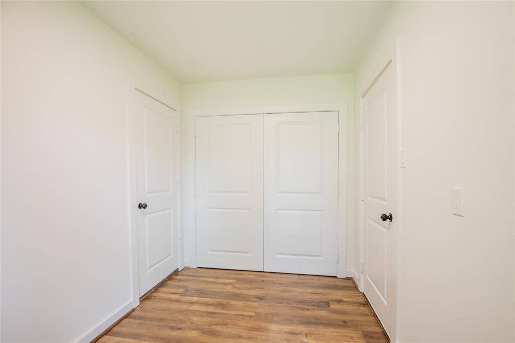 Bonus room adjacent to kitchen and living room. Could be used as a mud room or walk-in pantry