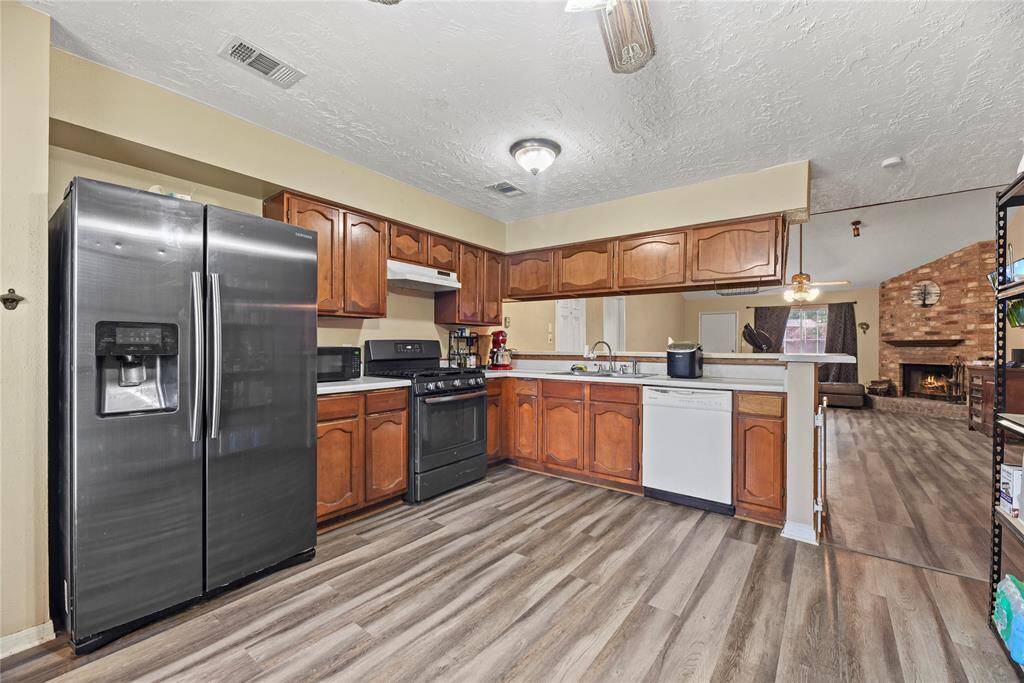 Kitchen features a gas stove.