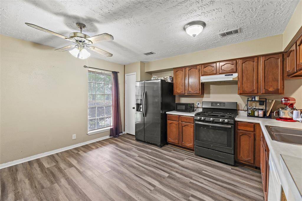 The large window provides for lots of natural light in the kitchen.