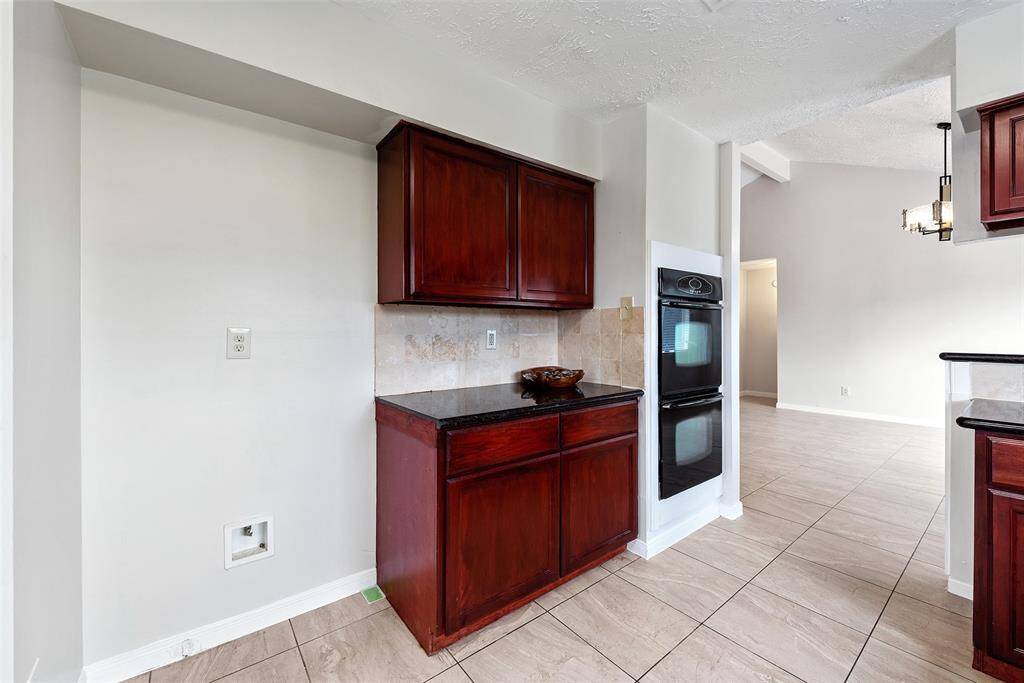 Double oven with more counter and cabinet space.