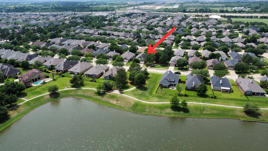 Aerial view of home and Lakeview