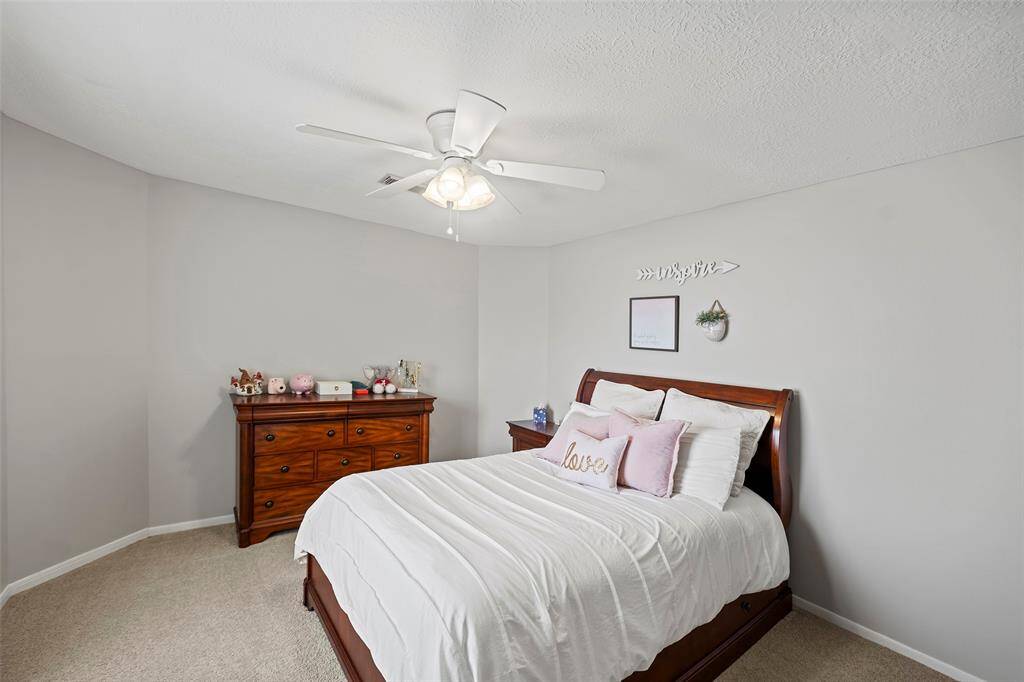 This view shows the ample space for your all your furniture needs, along with a neutral palette waiting for you to make it your own.