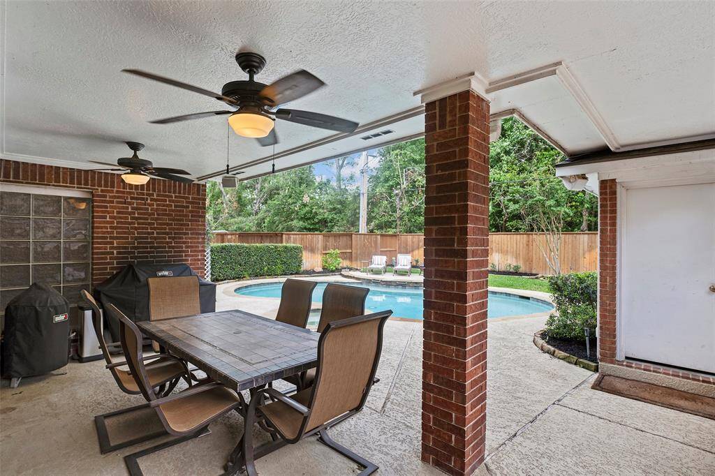 Step outside onto the covered patio, sit beneath a breezy fan, and enjoy the great outdoors!