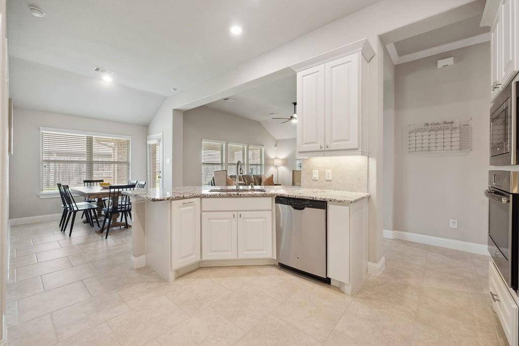 Prepping your weekly meals will be a breeze in your spacious chef’s kitchen that flows into your beautiful family room