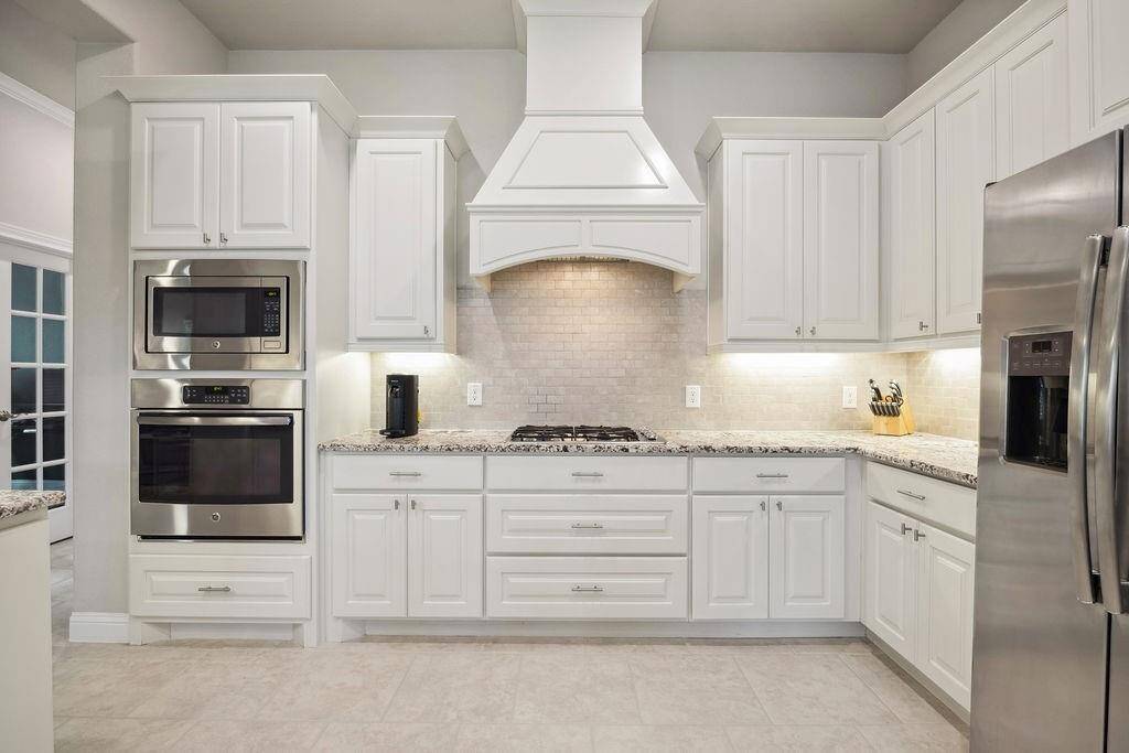 Prepping your weekly meals will be a breeze in your spacious chef’s kitchen that flows into your beautiful family room