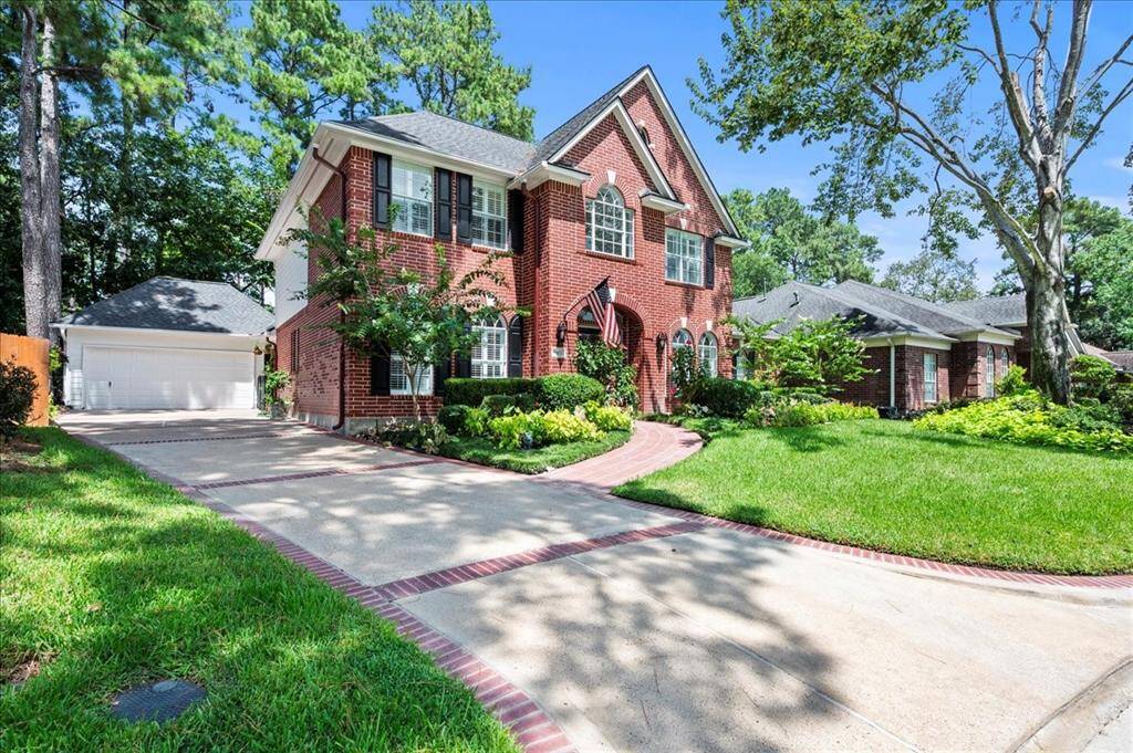 Long driveway into covered garage