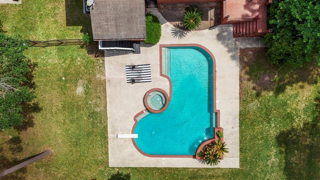 Several outdoor dining and entertainment spaces in this beautiful home.