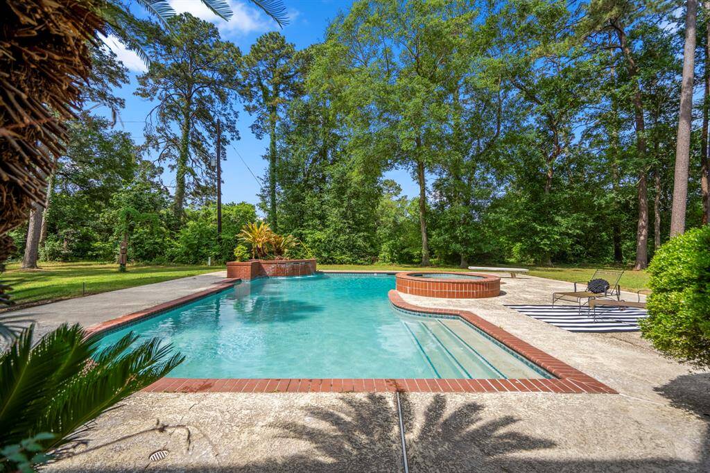 You will love living in this gorgeous estate which features no back neighbors and backs up to the golf course.
