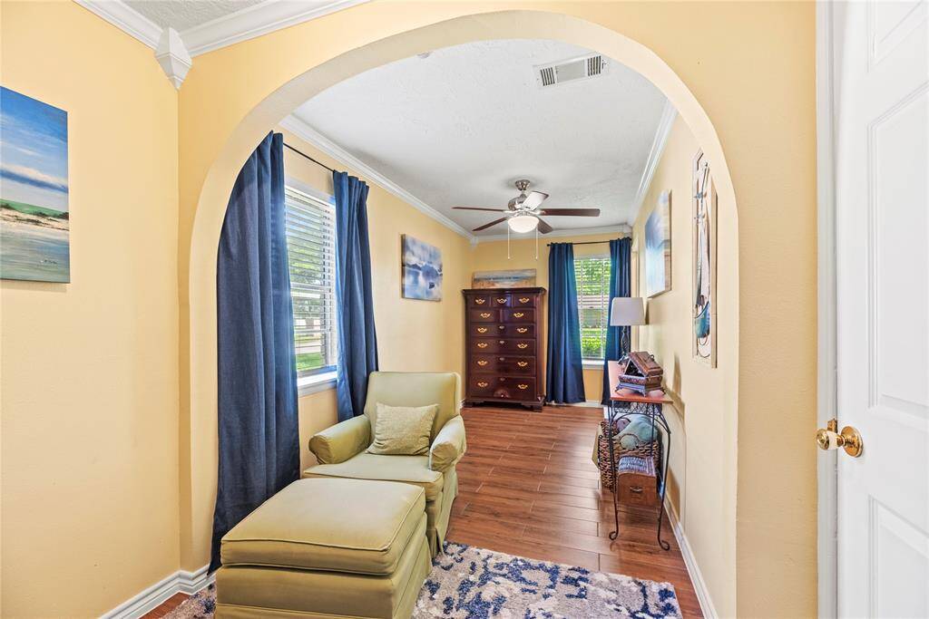 A cozy and private nook within the secondary suite—perfect for reading, relaxing, or starting your day with sunshine through the front-facing windows.
