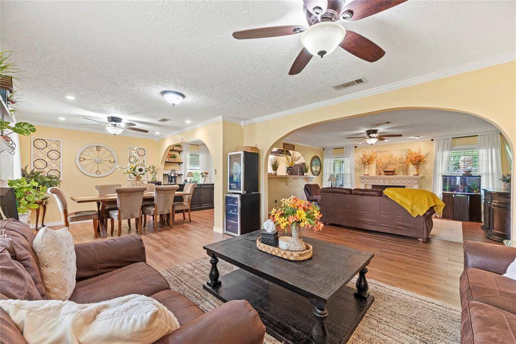 Spacious open layout combining the cozy living room and formal dining area, ideal for entertaining and everyday living.