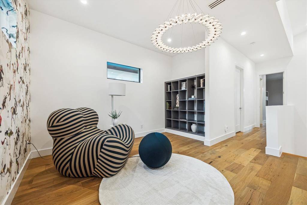 This upstairs play area adds to the upstairs living space when the media room is in use.