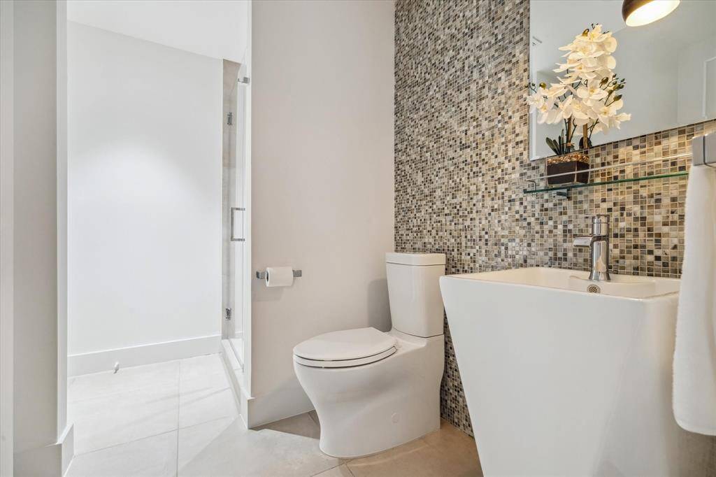 The guest bath is also a full bath. With direct access to the study, it adds the ability to have a second bedroom downstairs if needed.