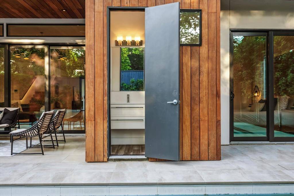 The pool bath is accessed from the outside, keeping wet feet from trapsing through the house.
