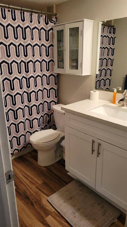 The secondary bathroom features a tub and shower combo.