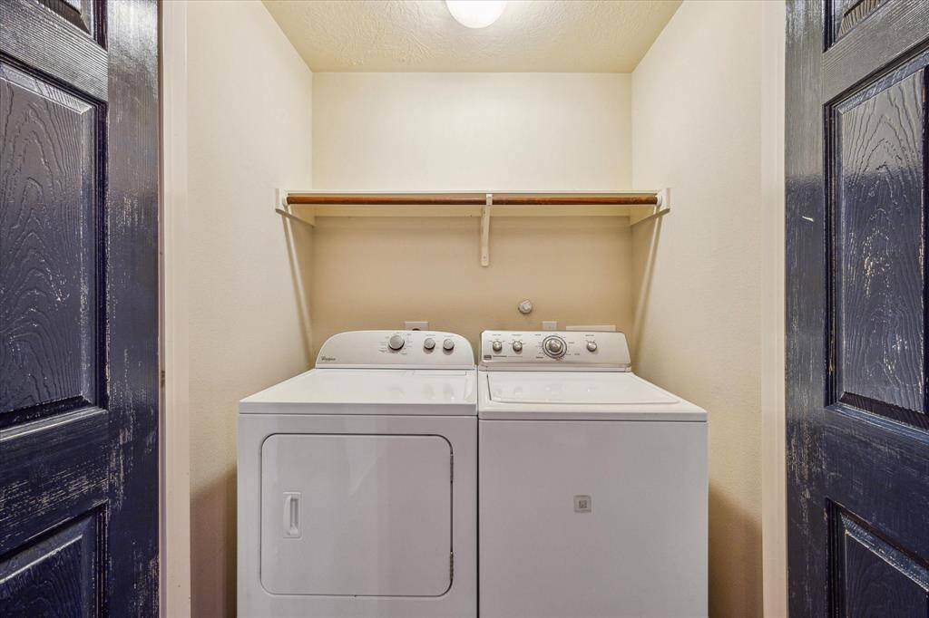 The indoor laundry room is conveniently located in the hallway. Full size clothes washer and clothes dryer are included.