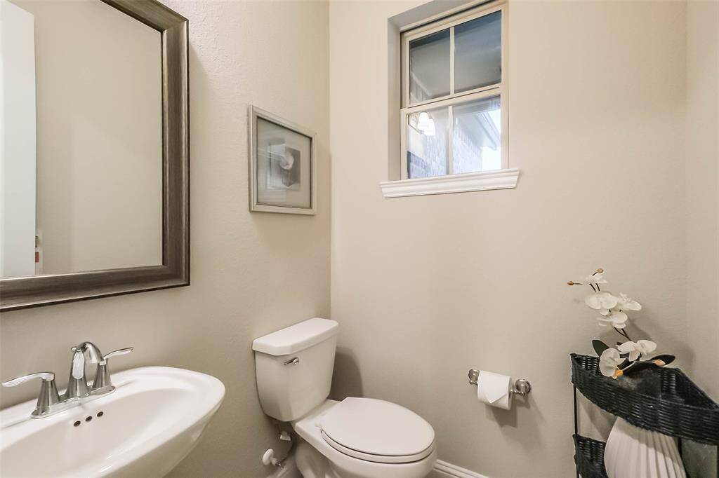 First floor powder bath is perfect for guests.