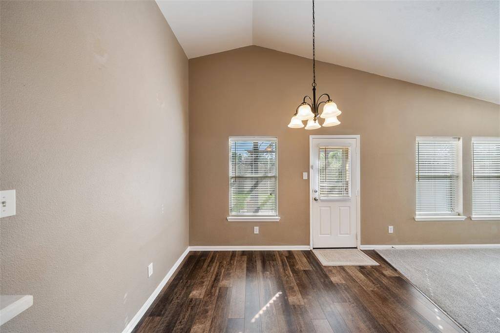 Your friends and family are going to love breaking bread with you in this charming dining area with luxury vinyl plank flooring, neutral paint and stylish lighting. With plenty of room for your dining table and sideboard, it’s the perfect setting for both everyday meals and special occasions.