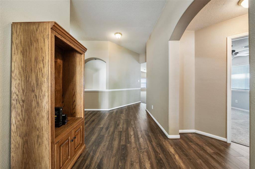 It will be love at first sight! Step inside to discover luxury vinyl plank flooring, designer neutral paint, art niches, abundant natural light, and a spacious layout designed for both everyday comfort and effortless entertaining.