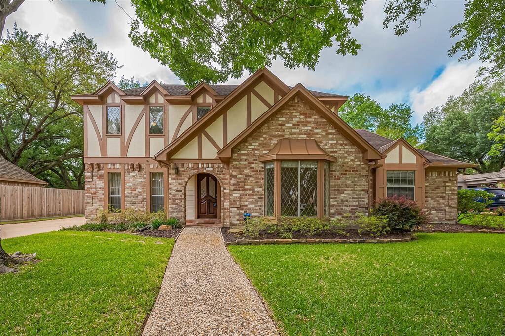 Charming Tudor-style home with leaded glass windows, located on a quiet cul-de-sac street canopied by mature shade trees. The exterior was freshly painted in 2024, adding to its timeless appeal. Roof replaced in 2009. Longtime owners say it’s been a wonderful place to raise their family, surrounded by incredible neighbors.