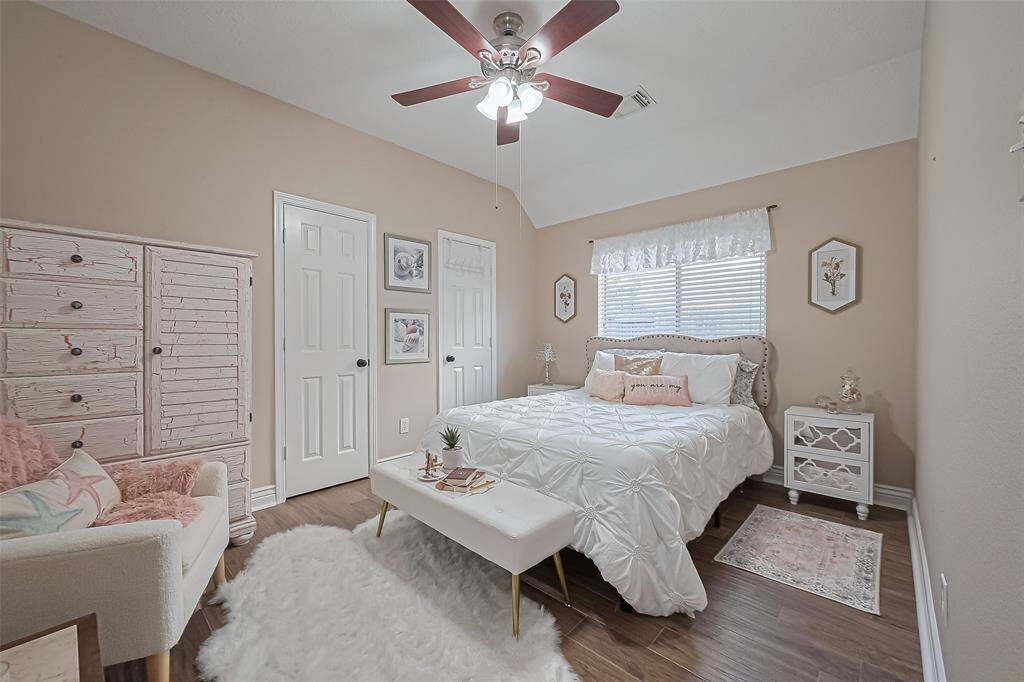 Bedroom #2 with wall-to-wall closet.