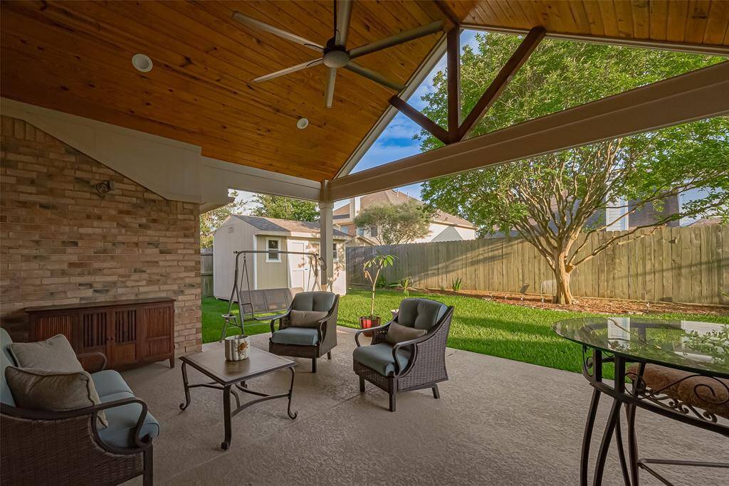 Impressive covered back porch added in 2020 is the perfect place to visit, watch TV, or just relax.