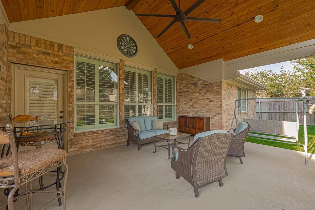 Impressive covered back porch added in 2020 is the perfect place to visit, watch TV, or just relax.