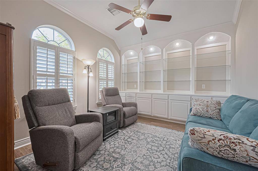 Lovely bonus room with built-ins could be perfect for your home office, library, gym, or anything you desire. Could even be converted into a 5th bedroom.