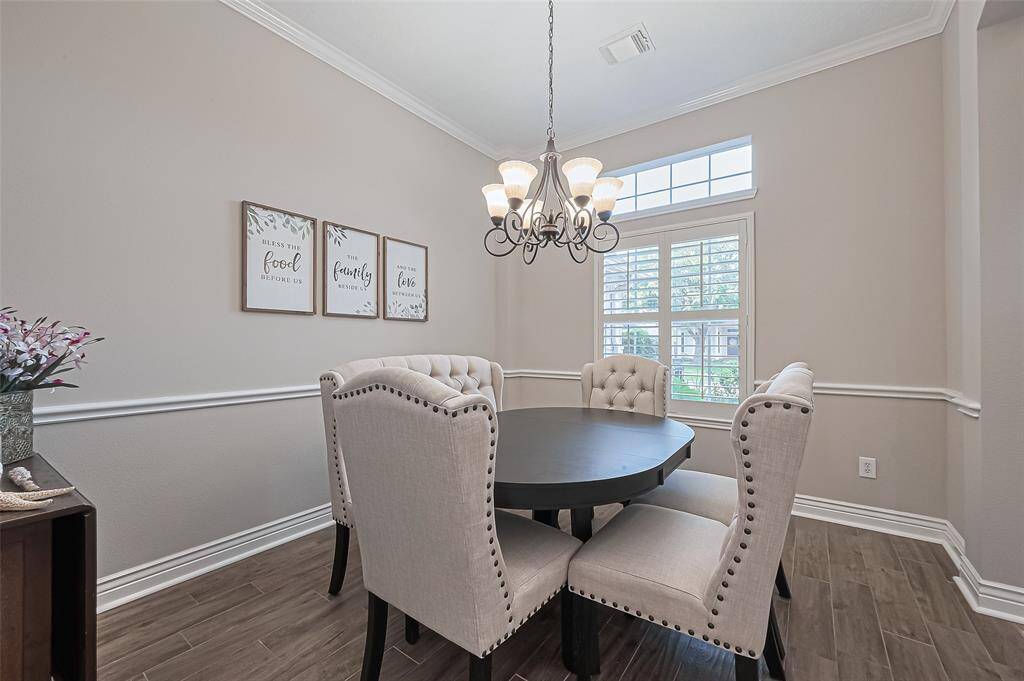 Formal dining room with French door access to the kitchen