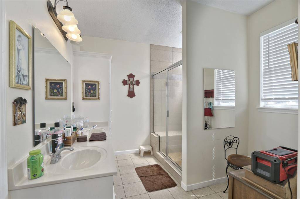 Primary Bathroom with Walk-In Closet