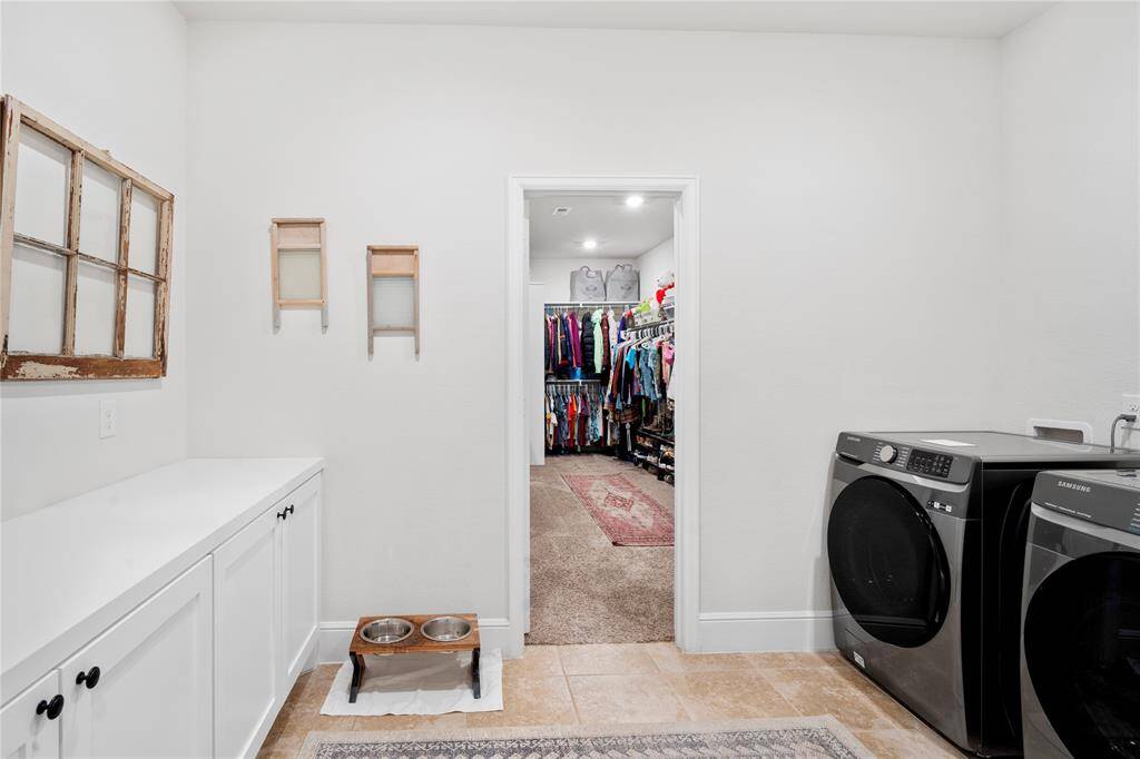 Laundry room with easy access to Primary Closet