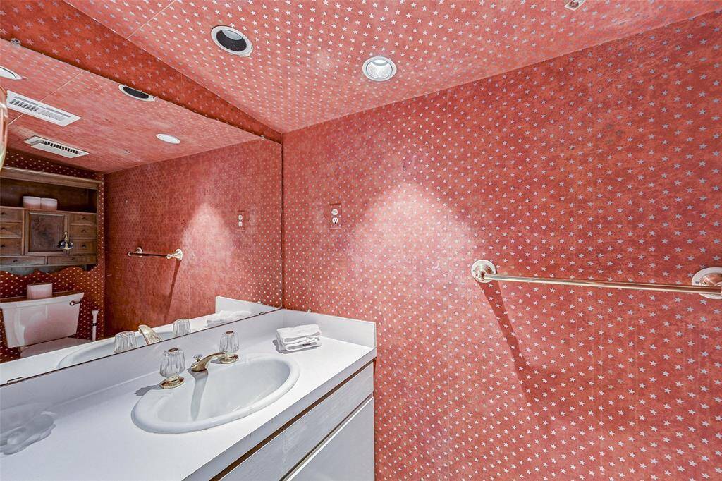Bathroom with built in storage and shower