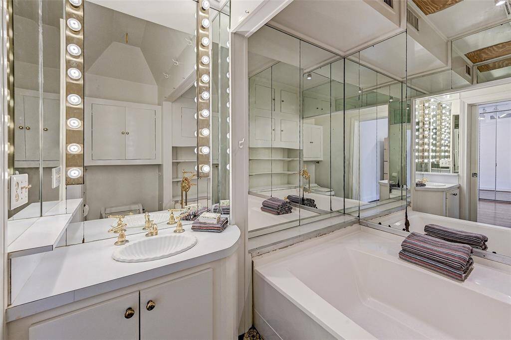 Another photo of primary bathroom