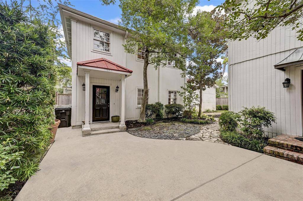 Two story, two bedroom, one bathroom guest house. Laundry area for main house is on first floor of guest house.