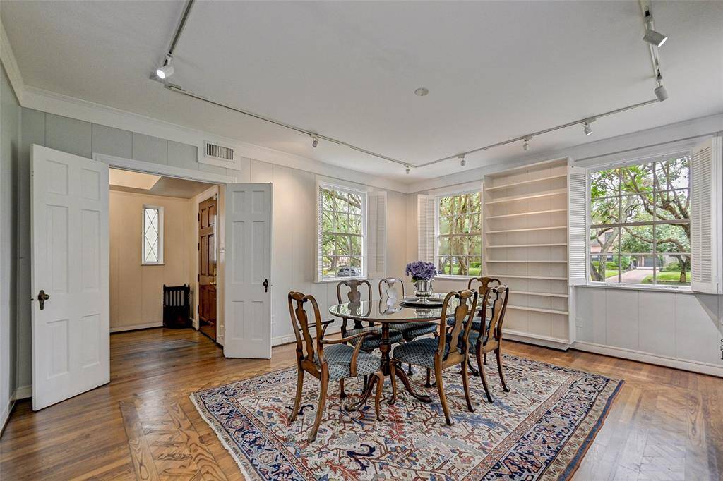 Formal dining room drenched in natural light