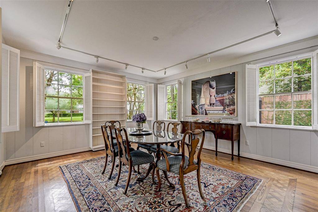 Original custom parquet floors throughout dining room, living room and den.