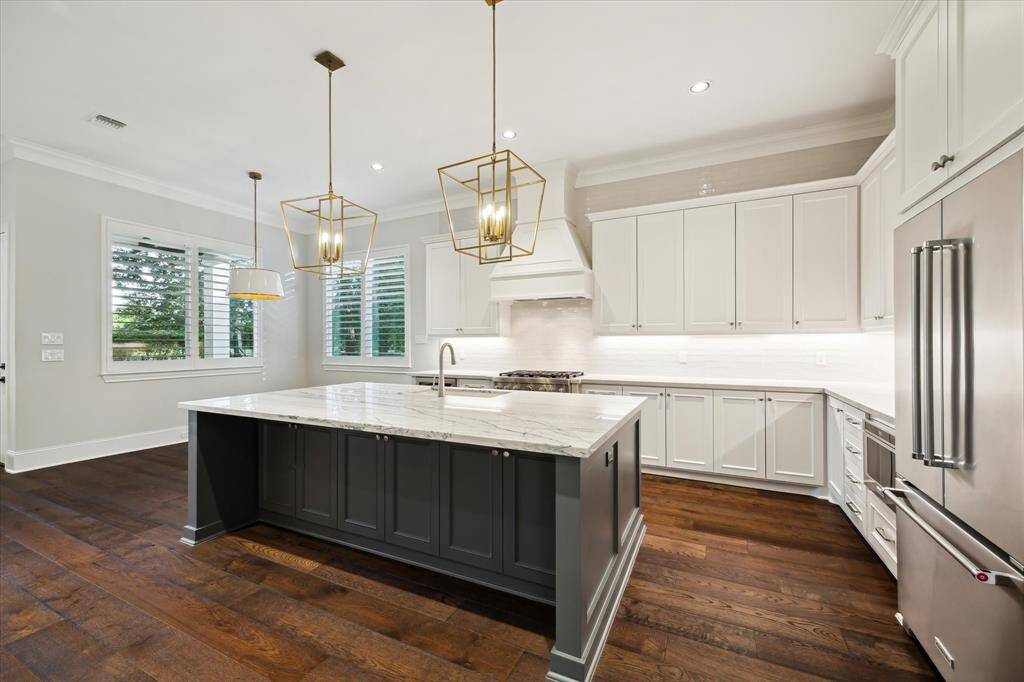 With tons of cabinet space and expansive countertops, prep work and entertaining is always on the menu.