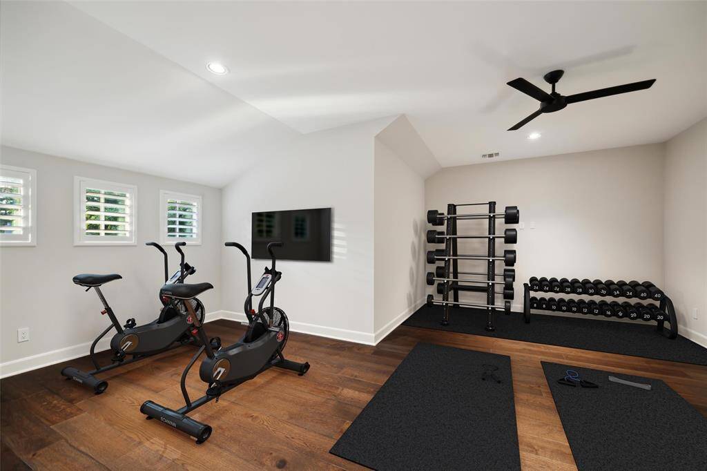Virtual staging of flex room as a gym.