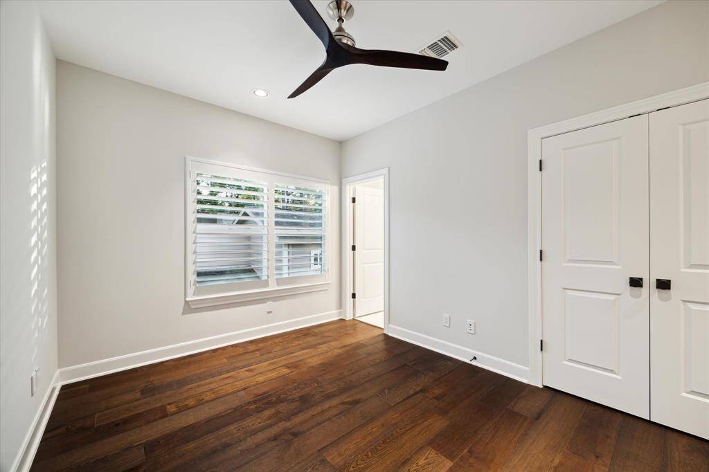 Neutral wall colors and dark wood floors provide a sophisticated canvas for homeowners to decorate with their own flair and expression of style.