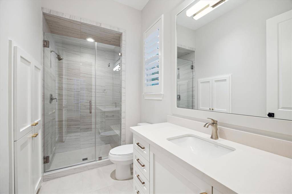 White and bright walls, counters and cabinets create a fresh and clean feel.
