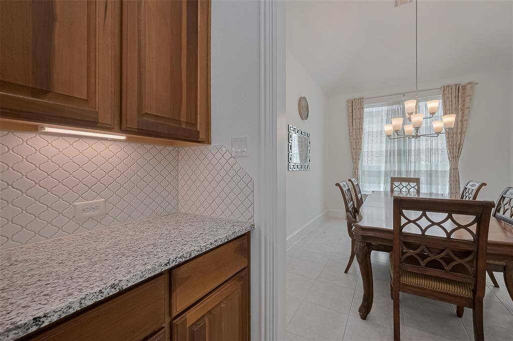 Convenient butlers pantry connecting the formal dining room.