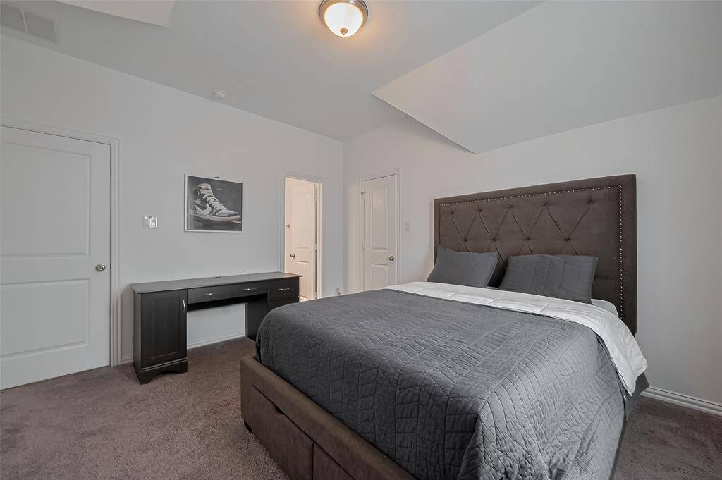 Upstairs bedroom 1 with private bathroom.