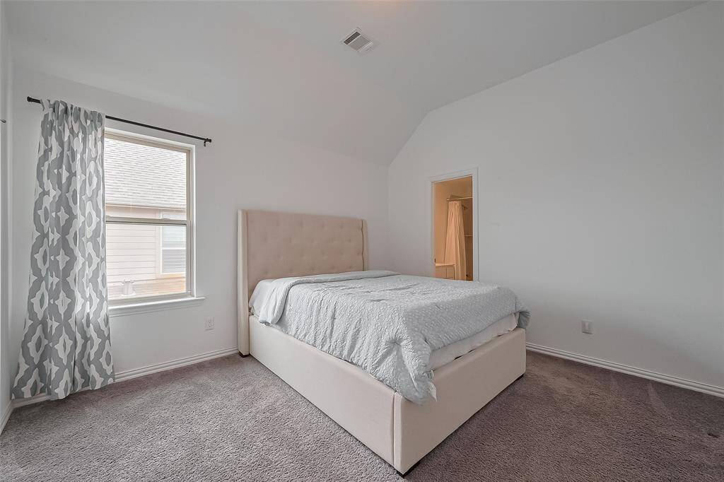 Upstairs bedroom 2 with private bathroom.