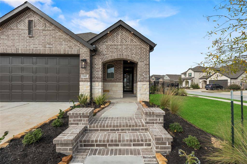 Welcome home to 18402 Mesquite Flats Trail in the esteemed Bridgeland Parkland Village community! This impressive aerial view showcases the prime location of this lot, perfectly positioned on a huge corner lot.