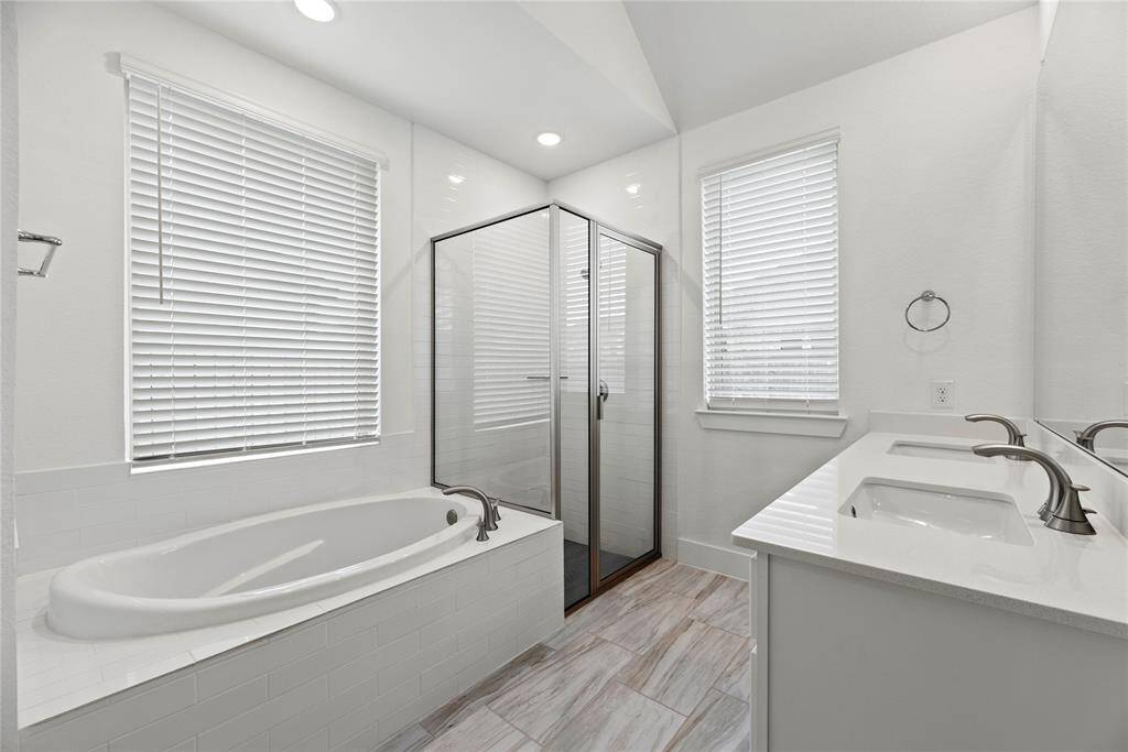 Relax in your deep soaking tub or opt for a quick rinse in the separate shower.