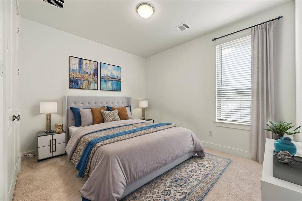 The thoughtfully designed layout of your second bedroom allows for natural light to flood the room, creating a warm and welcoming atmosphere.