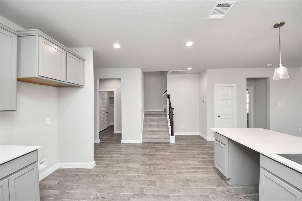 Sample photo of completed home with similar floor plan. Actual colors and selections may vary.