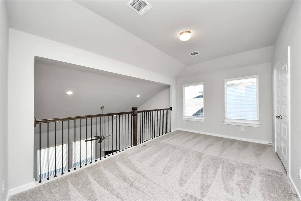 Discover another view of this stunning loft, perfect place for a game night with friends and family! Sample photo of completed home with similar floor plan. Actual colors and selections may vary.