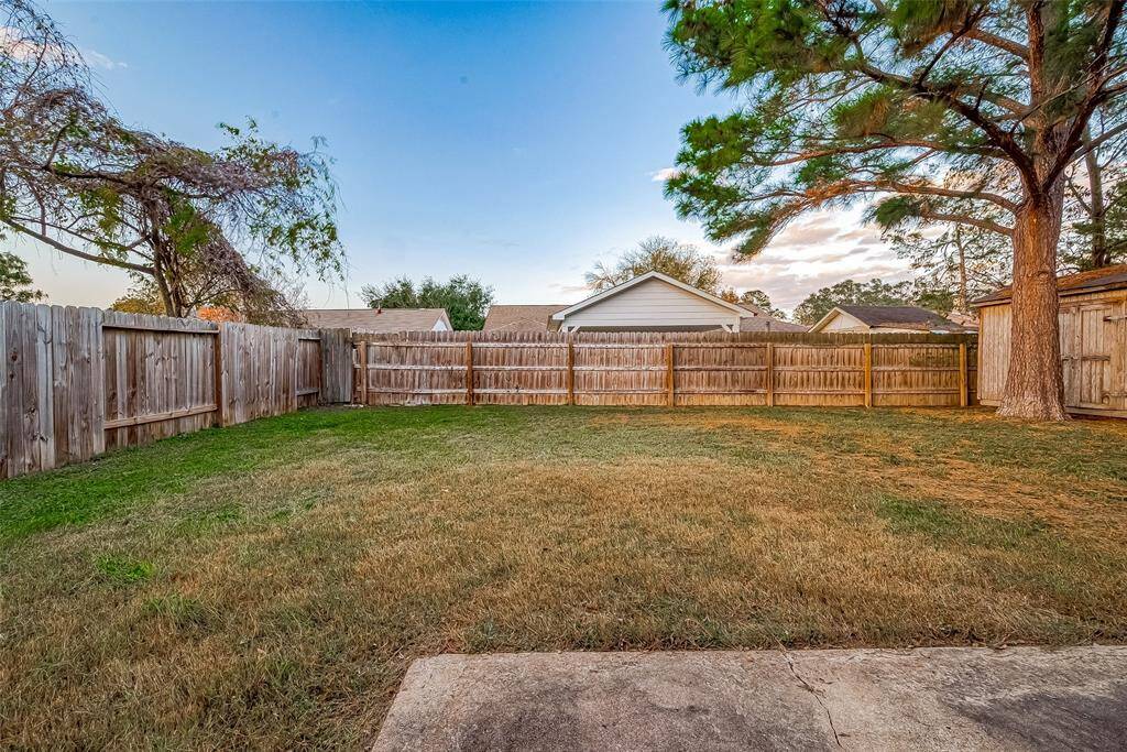 Large backyard perfect for kiddos to play