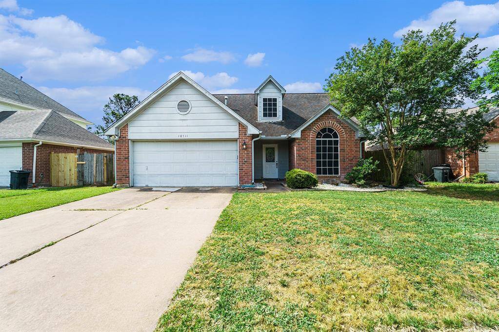 Welcome to your DREAM home at 18711 Forest Forge Drive in the Paddock Community!