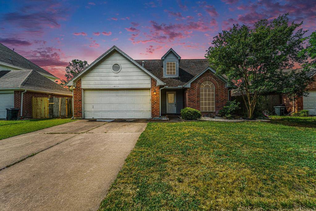 Twilight view of this charming home!